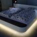 Schlafmöbel in Schleiflack weiß mit LED-Bettunterbeleuchtung